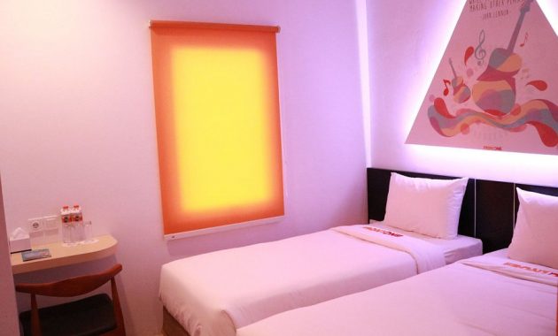 daftar harga kamar dan review front one inn, akomodasi murah dengan nuansa musik di kota semarang