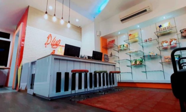daftar harga kamar dan review front one inn, akomodasi murah dengan nuansa musik di kota semarang