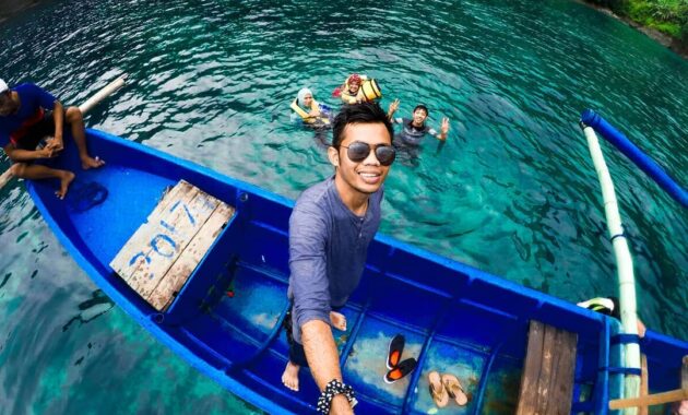 pantai banyu anjlok malang, adakah fasilitas snorkeling dan berapa harga tiket masuknya?