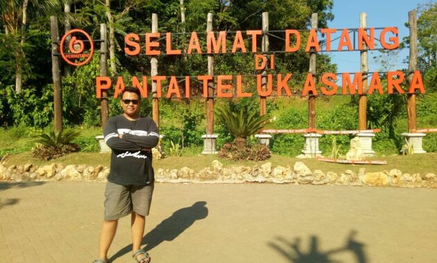 spot cantik pantai teluk asmara untuk sunset time di malang dan bagaimana jalan menuju lokasi?