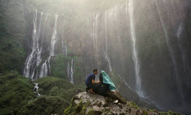 aktivitas seru coban sewu, coban sewu, coban sewu malang, daya tarik coban sewu, fasilitas coban sewu, harga tiket masuk coban sewu, kegiatan seru coban sewu, lokasi coban sewu, top 10+ foto air terjun coban sewu malang: harga tiket, fasilitas, daya tarik!